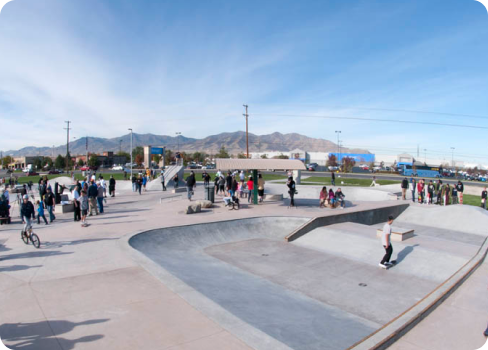 A skate park with people.